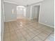 Open-concept living and dining area with tile floors and neutral paint at 1212 Utoy Springs Rd # 46, Atlanta, GA 30331