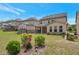 Landscaped backyard featuring a covered patio at 2320 Ivy Birch Ln, Buford, GA 30519