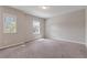 Neutral bedroom with natural light, carpet, and two windows with custom blinds at 2320 Ivy Birch Ln, Buford, GA 30519