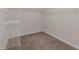 Walk-in closet with carpeted floor and wire shelving provides ample storage space at 2320 Ivy Birch Ln, Buford, GA 30519