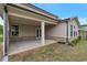 Covered patio featuring brick accents and an outdoor ceiling fan at 2320 Ivy Birch Ln, Buford, GA 30519