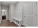 Functional mud room with storage bench and hooks at 2320 Ivy Birch Ln, Buford, GA 30519