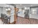 Open kitchen with quartz countertops, stainless appliances, and an island with bar seating at 2653 Elkhart Sw Cir, Marietta, GA 30064