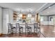 Open kitchen with quartz countertops, stainless appliances, and an island with bar seating at 2653 Elkhart Sw Cir, Marietta, GA 30064