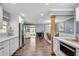 Spacious kitchen featuring white cabinets, stainless steel appliances, and an open layout at 2653 Elkhart Sw Cir, Marietta, GA 30064