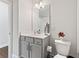 Bathroom with gray vanity, toilet, and tiled floors at 3219 Blackshear Dr, Marietta, GA 30060