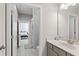 Bathroom with gray vanity and tiled floor leading to bedroom at 3219 Blackshear Dr, Marietta, GA 30060
