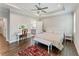 Spacious bedroom featuring tray ceilings, hardwood floors, and neutral tones at 3219 Blackshear Dr, Marietta, GA 30060