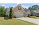 Charming home with well-manicured lawn and attached two-car garage, with brick and siding accents at 3219 Blackshear Dr, Marietta, GA 30060