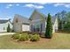 Charming home with a well-maintained lawn, mature landscaping, and a combination of brick and siding at 3219 Blackshear Dr, Marietta, GA 30060