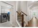 Hallway with stairs leading to the laundry room at 3219 Blackshear Dr, Marietta, GA 30060