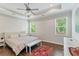 Calm main bedroom with tray ceilings, large windows, and a neutral color palette, creating a peaceful retreat at 3219 Blackshear Dr, Marietta, GA 30060