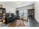 Office space with hardwood floors, large window and built in shelving at 3219 Blackshear Dr, Marietta, GA 30060