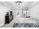 Bedroom with gray walls, a dresser, and views into the bathroom and kitchen at 4100 Paces Se Walk # 2304, Atlanta, GA 30339