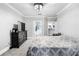 Bedroom featuring a large dresser and view into the bathroom at 4100 Paces Se Walk # 2304, Atlanta, GA 30339