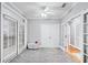 Bedroom featuring neutral walls, carpet, a ceiling fan, and glass doors leading to an outdoor space at 4100 Paces Se Walk # 2304, Atlanta, GA 30339