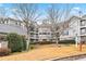 Well-manicured condo community with lush shrubbery and green space at 4100 Paces Se Walk # 2304, Atlanta, GA 30339