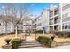 Beautiful condo exterior with inviting entrance and landscaping at 4100 Paces Se Walk # 2304, Atlanta, GA 30339