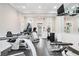 Community gym equipped with treadmills, stationary bikes, free weights, and mirrored wall accents at 4100 Paces Se Walk # 2304, Atlanta, GA 30339