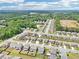 Stunning aerial view of a residential community surrounded by lush greenery and convenient roads at 66 Cottontail Ln, Loganville, GA 30052