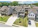 Stunning aerial view of a home showcasing its well-maintained yard, driveway, and neighborhood at 66 Cottontail Ln, Loganville, GA 30052