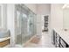 Stylish bathroom with a luxurious glass shower and elegant tile work at 66 Cottontail Ln, Loganville, GA 30052