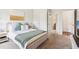 Bright bedroom with neutral walls, carpeted floor, and stylish décor and ensuite bathroom access at 66 Cottontail Ln, Loganville, GA 30052