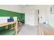 ' bedroom with bunk beds and desk with green accent wall at 66 Cottontail Ln, Loganville, GA 30052