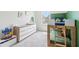 ' bedroom featuring a bunk bed with a dresser, with a green accent wall at 66 Cottontail Ln, Loganville, GA 30052