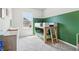 ' bedroom with a bunk bed, a dresser, and a green accent wall at 66 Cottontail Ln, Loganville, GA 30052