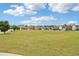 A wide open green space in a residential community provides a serene and inviting atmosphere for outdoor activities and enjoyment at 66 Cottontail Ln, Loganville, GA 30052