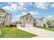Two-story home featuring a two-car garage and an additional one-car garage at 66 Cottontail Ln, Loganville, GA 30052