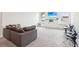 Bright living room showcasing built-in shelving and comfortable seating at 66 Cottontail Ln, Loganville, GA 30052