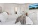 Luxurious main bedroom with a tray ceiling and ample natural light at 66 Cottontail Ln, Loganville, GA 30052