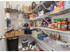 Walk-in pantry features ample shelving and storage space for an organized kitchen at 66 Cottontail Ln, Loganville, GA 30052