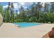 Sparkling community pool with a spacious deck area, ideal for summer relaxation and recreation at 66 Cottontail Ln, Loganville, GA 30052