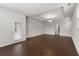 Sun-filled living area featuring modern floors, and plenty of space for furniture and decor at 7995 Brewton Creek Dr, Cumming, GA 30028