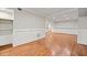 Bright finished basement featuring recessed lights, wainscotting, and wood-look floors at 1131 Mayfield Dr, Decatur, GA 30033