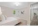 The bedroom showcases a bed with a headboard, a window, and a closet at 1131 Mayfield Dr, Decatur, GA 30033