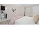 Bedroom with a bed and en suite bathroom showcases a clean and tranquil atmosphere at 1131 Mayfield Dr, Decatur, GA 30033