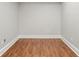 Cozy room featuring wood-look floors, neutral paint, and white trim at 1131 Mayfield Dr, Decatur, GA 30033