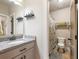 Bathroom with a vanity and granite countertops, complemented by the view of a toilet and shower at 1963 Skybrooke Ln, Hoschton, GA 30548