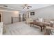 Bright upstairs bonus room features a comfortable seating area, carpet, and large windows at 1963 Skybrooke Ln, Hoschton, GA 30548