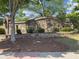 Attractive stone community entrance with mature landscaping and a welcoming ambiance at 1963 Skybrooke Ln, Hoschton, GA 30548