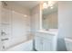 Bathroom with tub, shower, and single sink vanity at 4822 Floydwood Ln, Mableton, GA 30126
