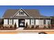 Exterior of building with peaked roof and grey horizontal siding at 4822 Floydwood Ln, Mableton, GA 30126