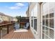 Cozy back deck featuring two chairs, a small table and a view at 4879 Seldon Se Way, Smyrna, GA 30080