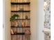 Charming bathroom with rustic shelving and decorative wallpaper at 4879 Seldon Se Way, Smyrna, GA 30080