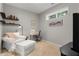 Bright bedroom with a comfortable sitting area and desk, perfect for relaxation and work at 4879 Seldon Se Way, Smyrna, GA 30080