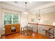 View of a bright breakfast nook area featuring hardwood floors, natural light, and a cozy dining space at 4879 Seldon Se Way, Smyrna, GA 30080